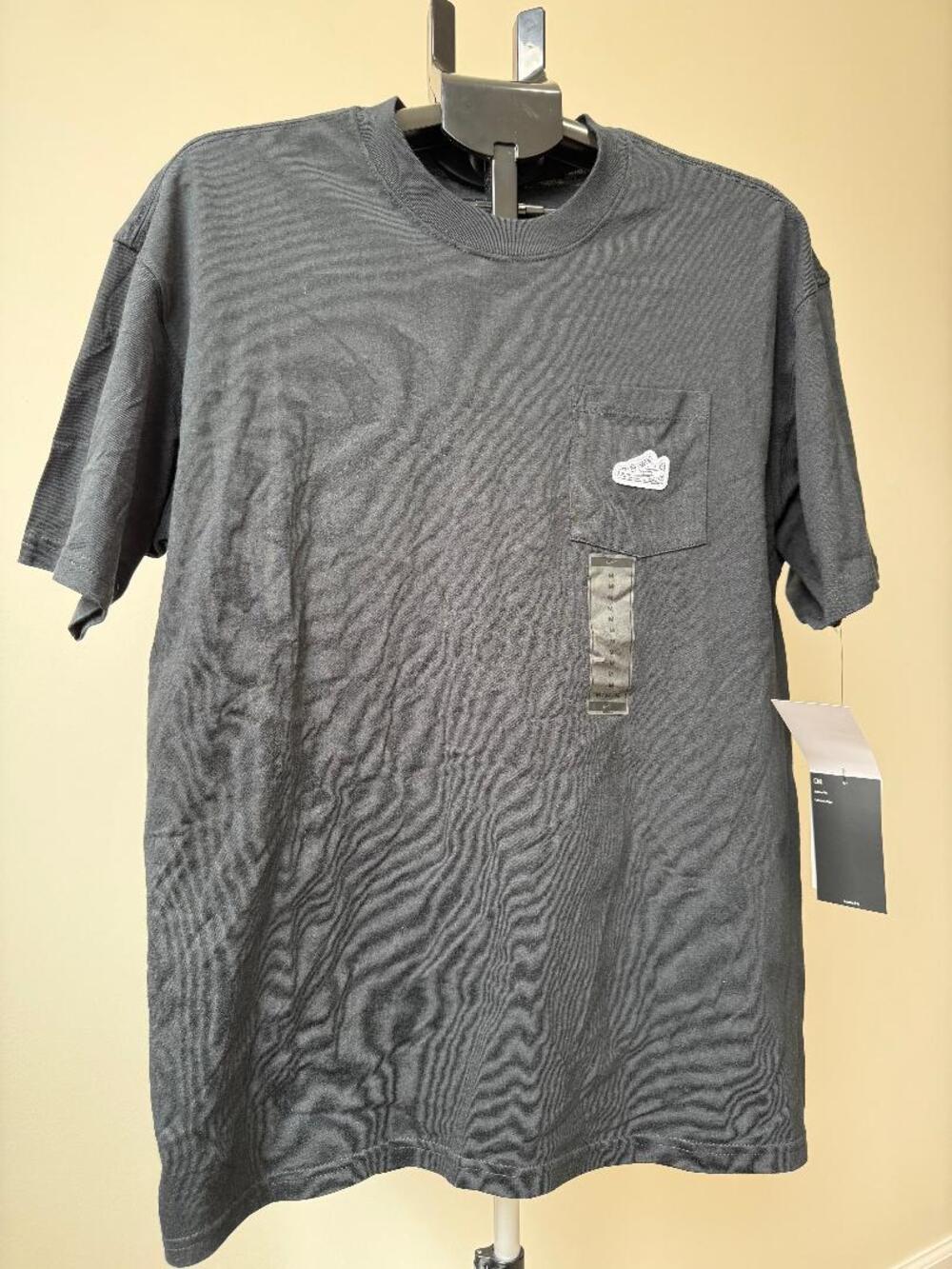 The Nike Tee Loose fit Men's Medium Black tee shirt.  Nike Air Force 1